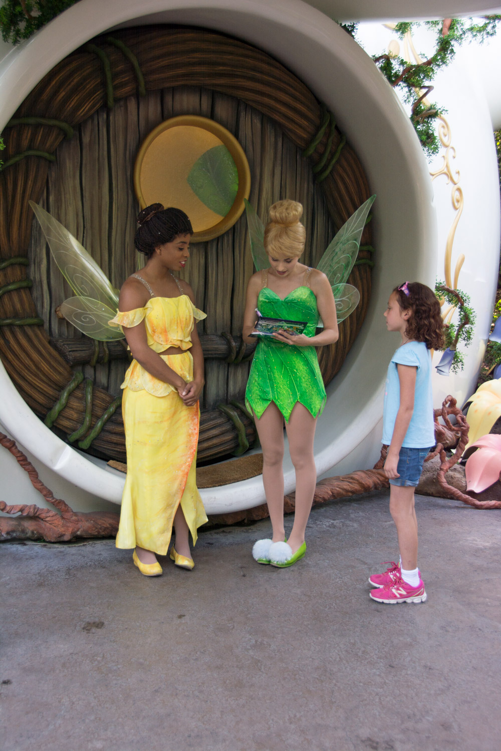 Katie getting Tinker Bell's autograph