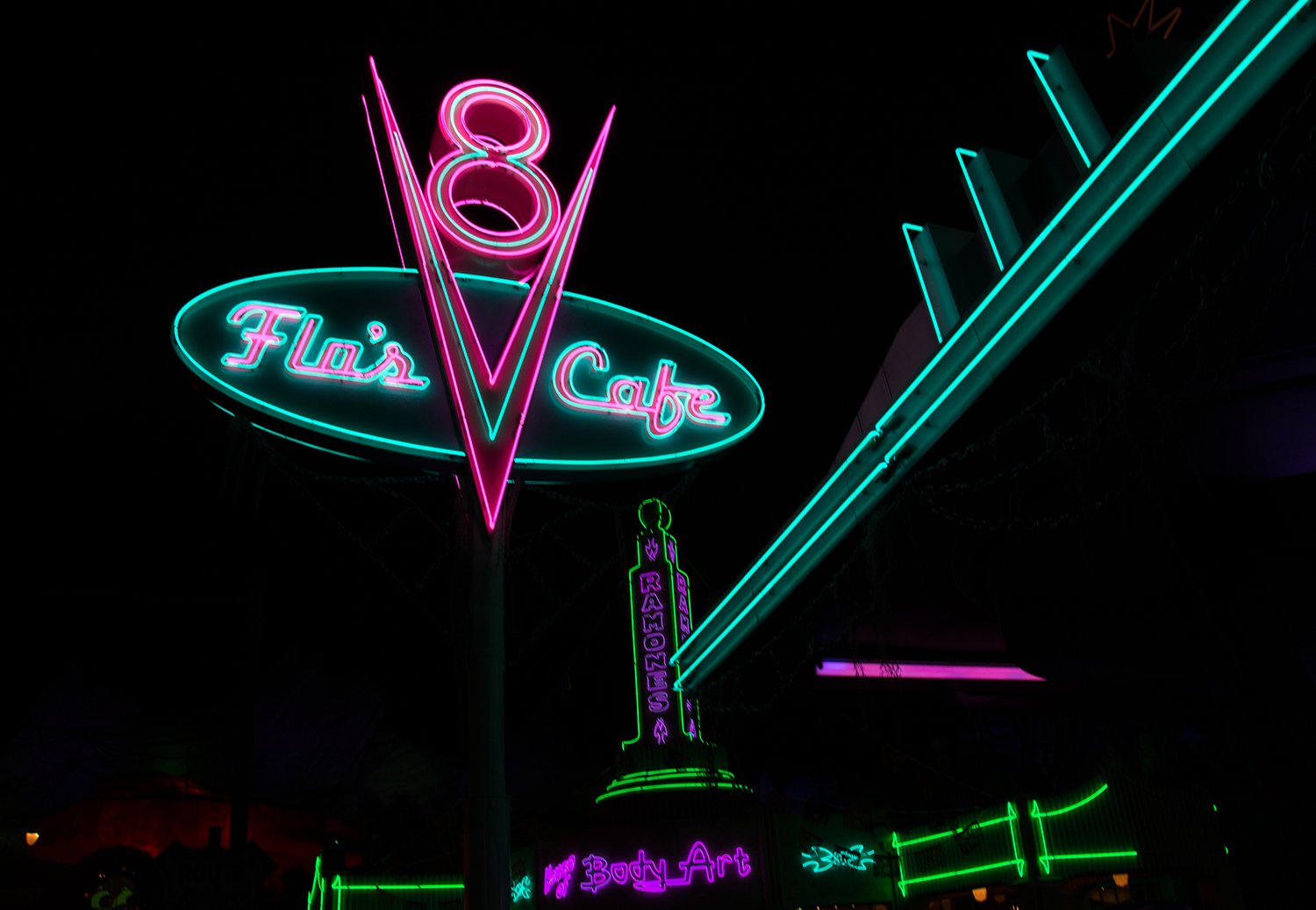 Flo and Ramon's neon signs at night